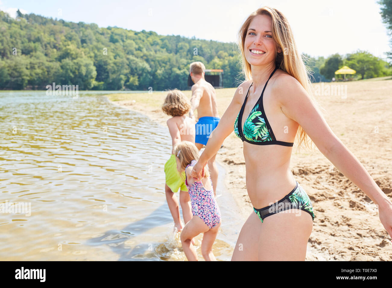 Family run beach bikini hi-res stock photography and images - Alamy