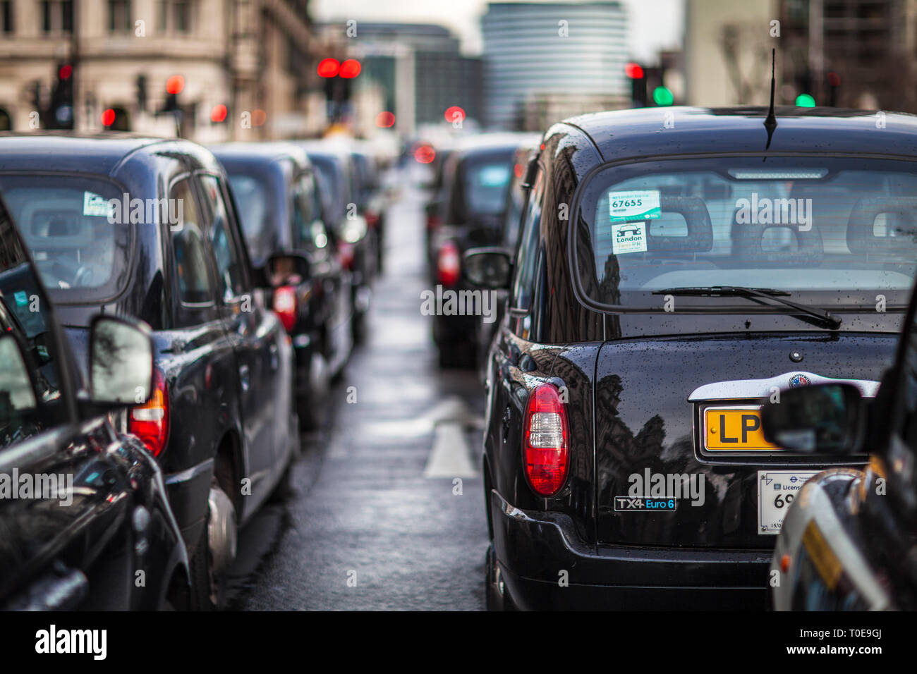 London Taxi Queue - London Taxis queue in Westminster in Central London London Black Cabs. Stock Photo
