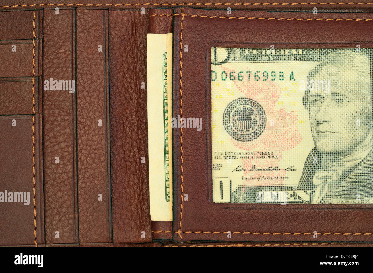 10 dollar bill in a wallet Stock Photo - Alamy