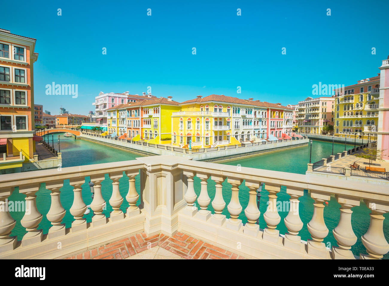 Scenary of Venice at Qanat Quartier in the Pearl-Qatar, Persian Gulf, Middle East. Aerial view of Venetian bridge and canals of picturesque and Stock Photo