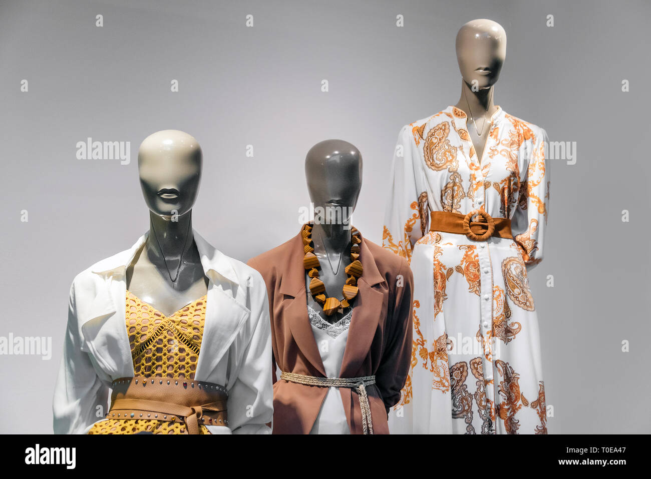 Female mannequins standing in store window display of women casual clothing  shop in shopping mall Stock Photo - Alamy
