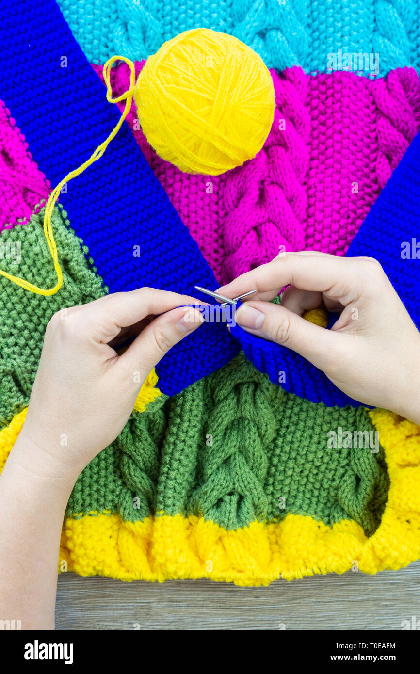 Knitting hands blue hi-res stock photography and images - Page 6 - Alamy