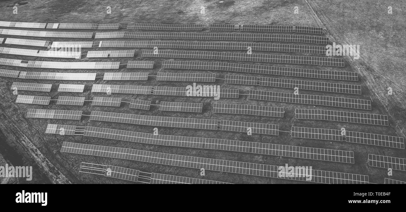 Aerial drone view of solar panels at a solar energy farm. Vilnius county, Lithuania Stock Photo