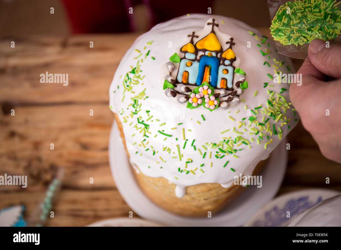 cakes in the process of decorating Stock Photo - Alamy