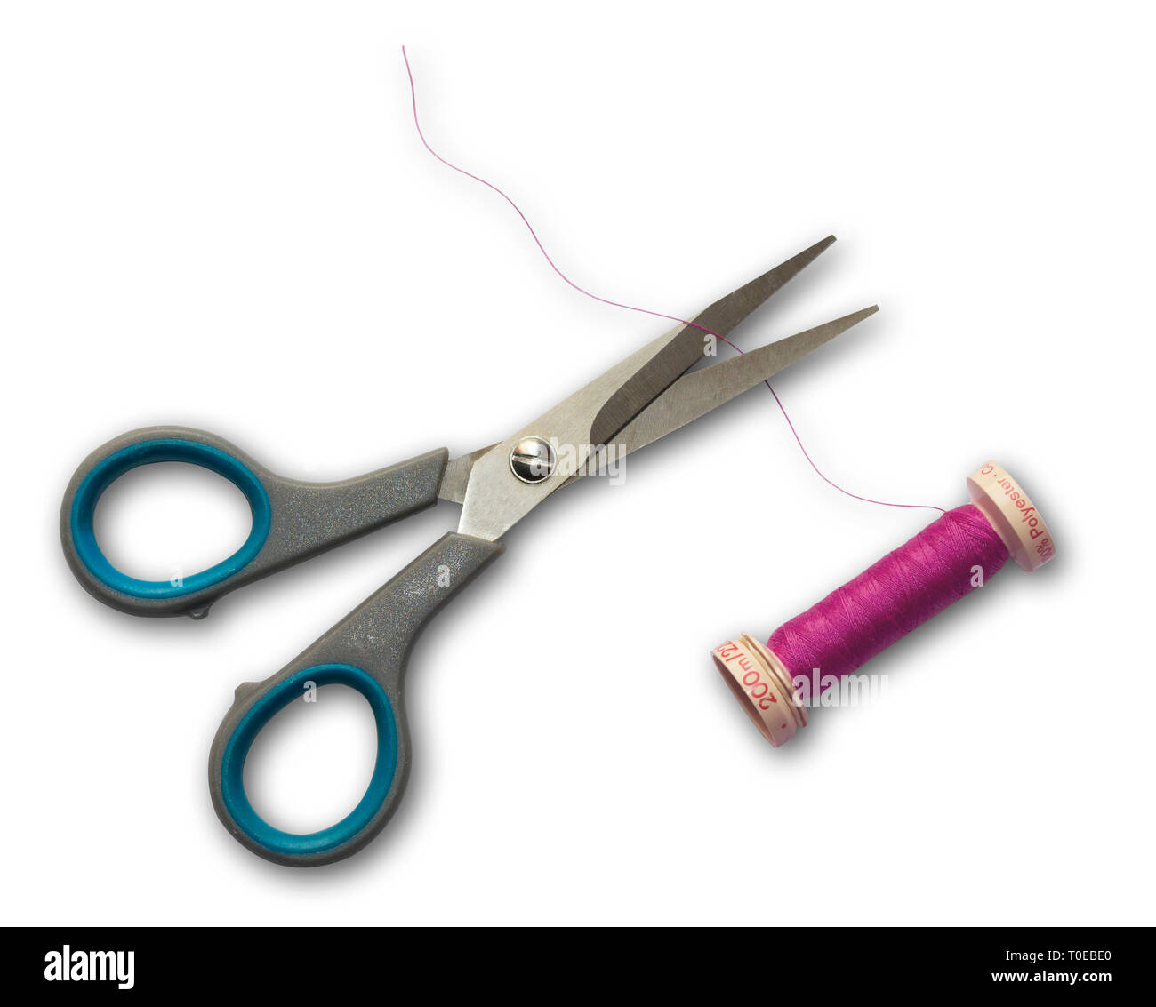 Sewing scissors cutting thread Stock Photo