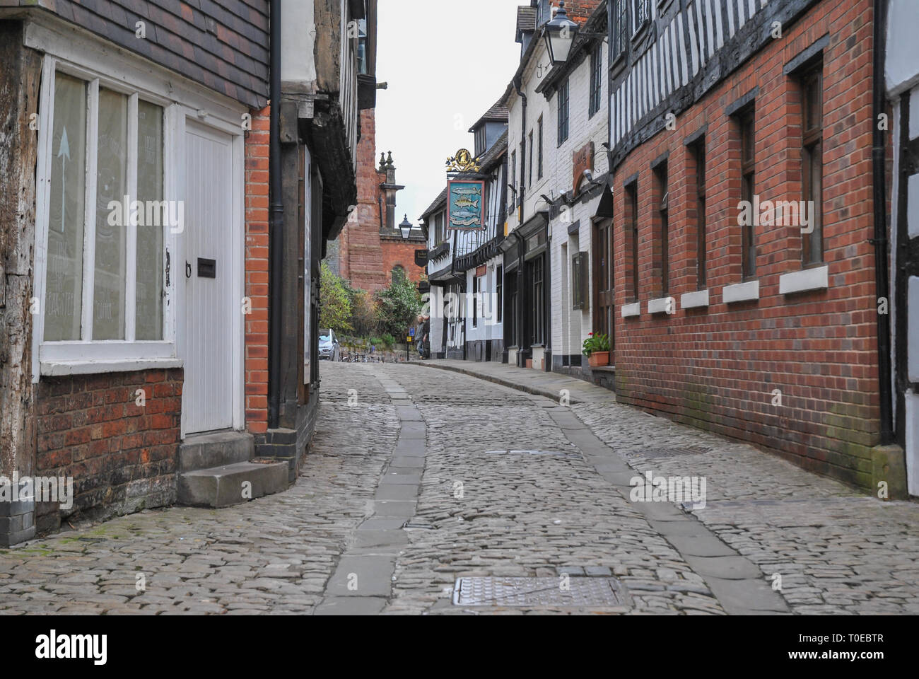 Fish Street in Shrewsbury showing old cobble stones and cart way Stock Photo