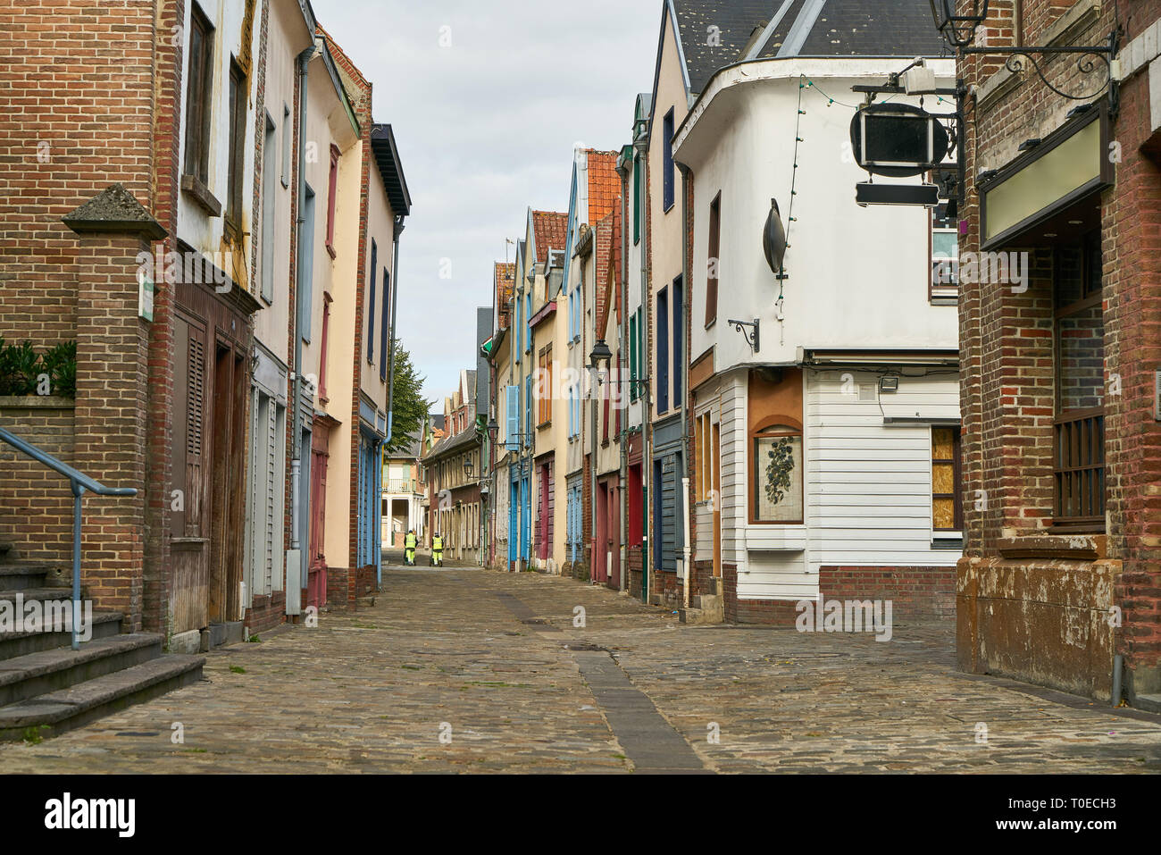 Narrow street with houses in the old town of Amiens, France Stock Photo