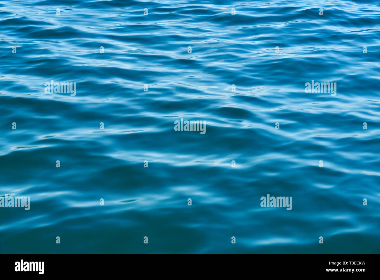 Blue water surface from the sea or ocean with light waves Stock Photo ...