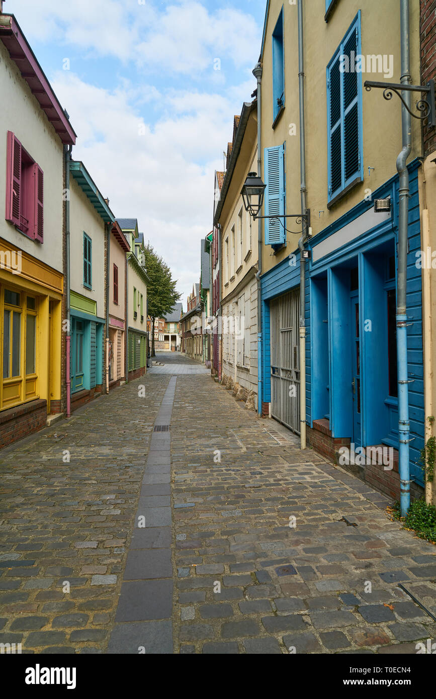 Narrow empty alley in the old town of Amiens, France Stock Photo