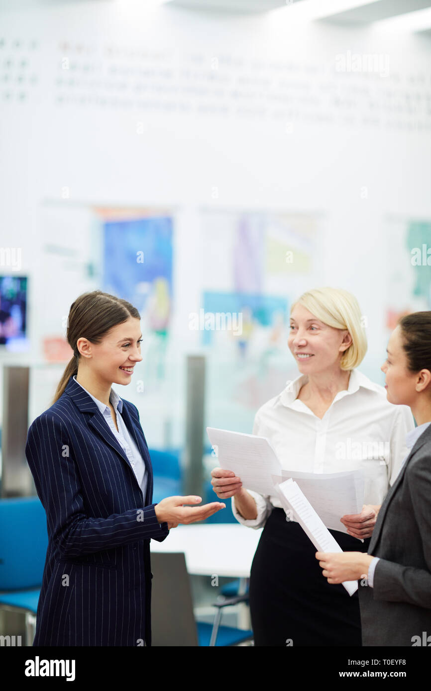 Businesswomen Talking in Office Stock Photo