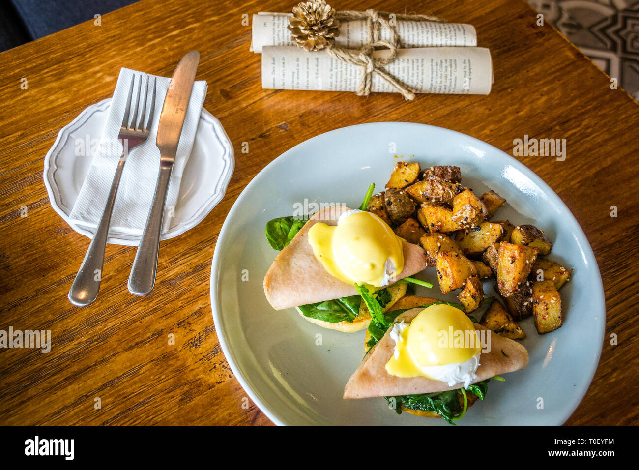 Organic Egg Benedict Poached egg, smoked turkey ham, baby spinach