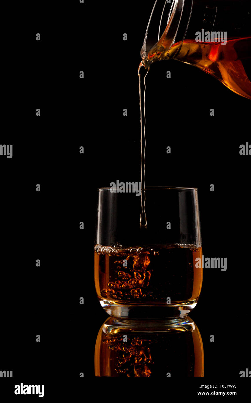 Brandy, whiskey, brandy juice in a glass Stock Photo Alamy