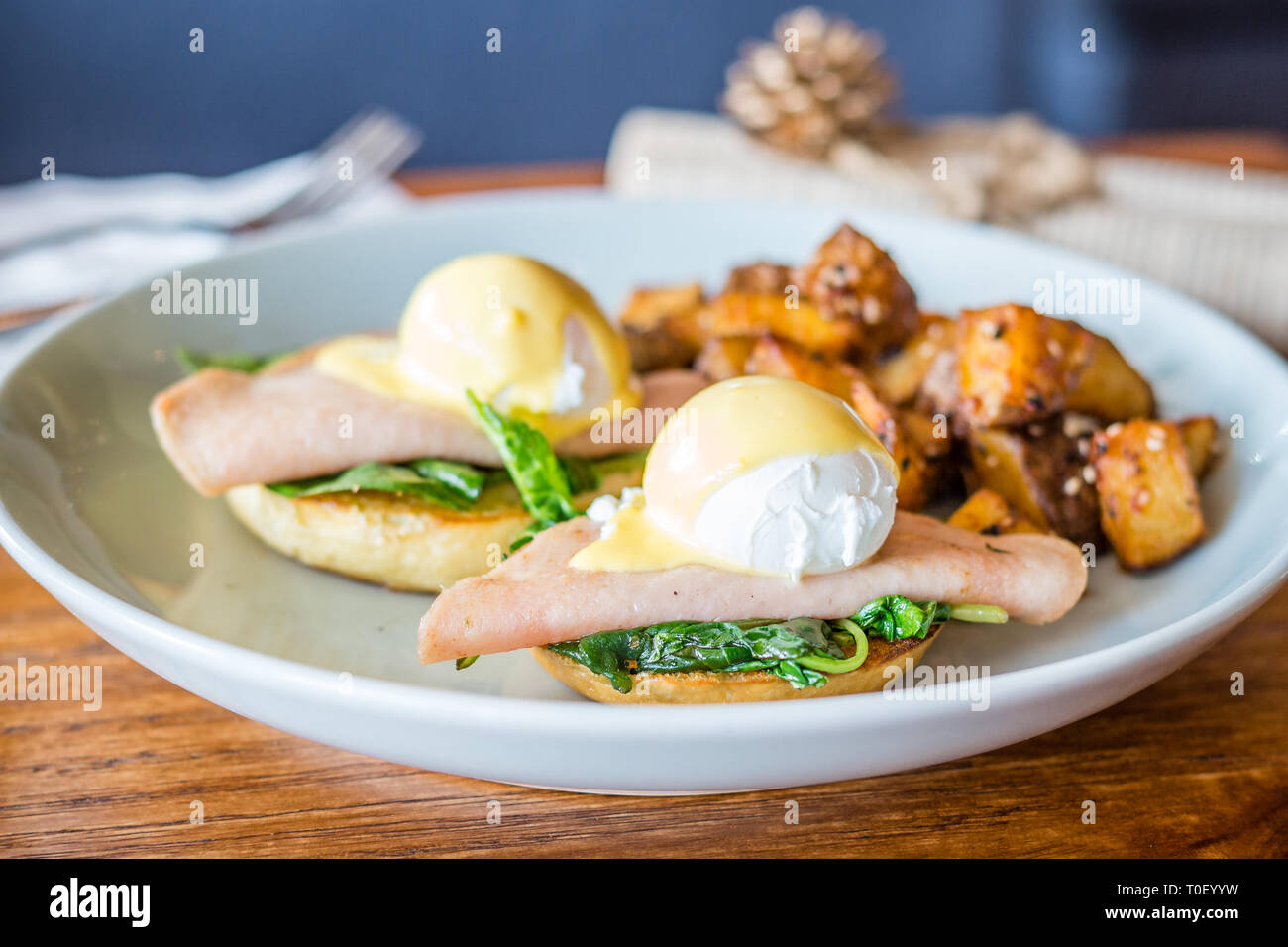 Organic Egg Benedict Poached egg, smoked turkey ham, baby spinach