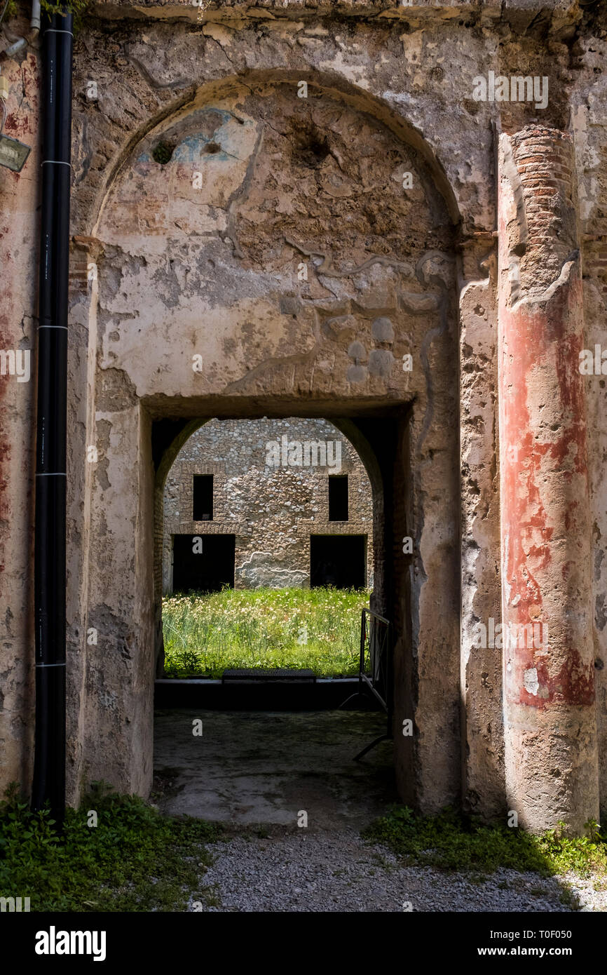Red paint still visible in the ruins of Villa Romana, an ancient Roman archaeological site hidden in the village of Minori, Italy on the Amalfi Coast Stock Photo