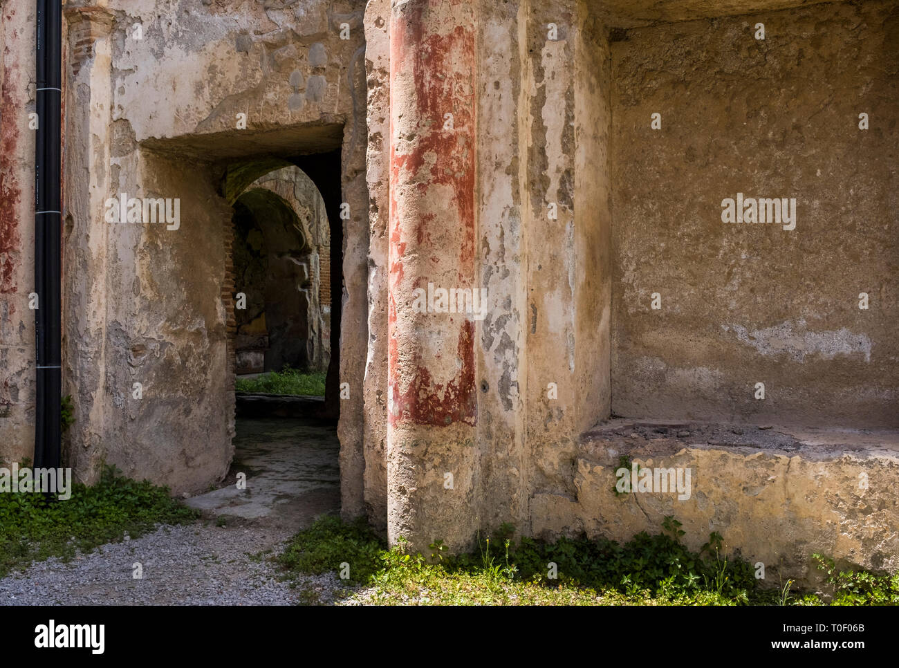 Red paint still visible in the ruins of Villa Romana, an ancient Roman archaeological site hidden in the village of Minori, Italy on the Amalfi Coast Stock Photo