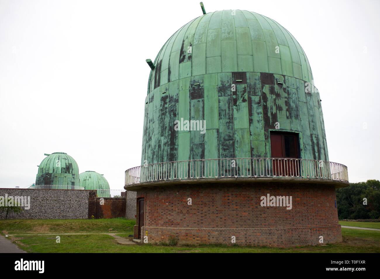 The three telescope domes at The Observatory Science Centre, Herstmonceux, East Sussex, UK Stock Photo