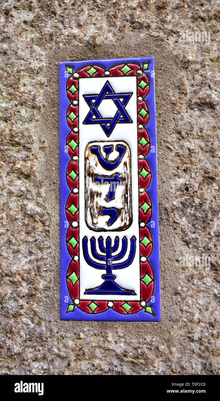 Colorful tile Mezuzah with Star of David and Menorah. Jewish Sephardic