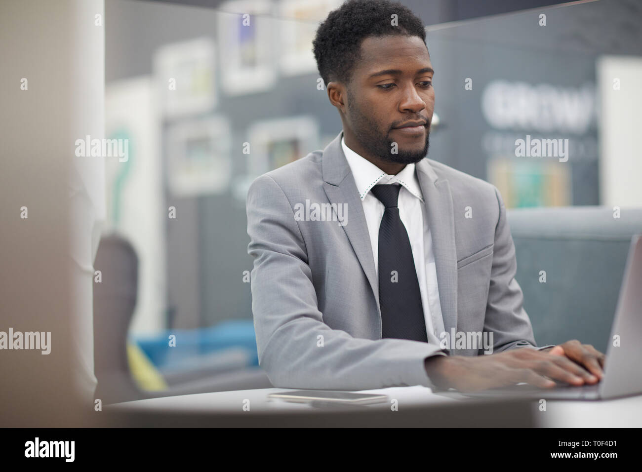 Successful African Businessman at Work Stock Photo