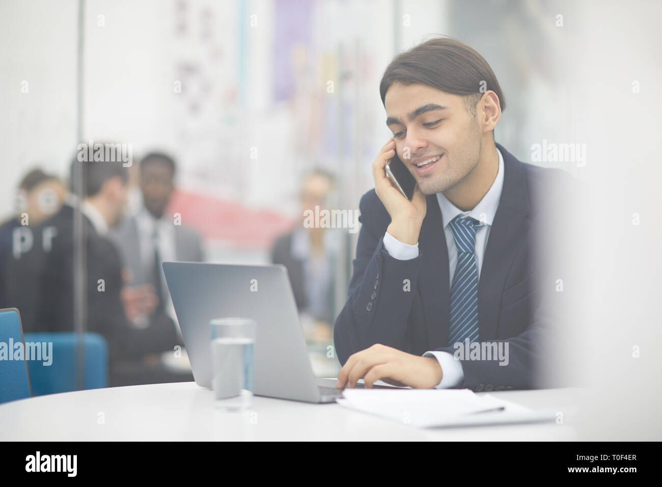 Middle-Eastern Businessman Working Stock Photo