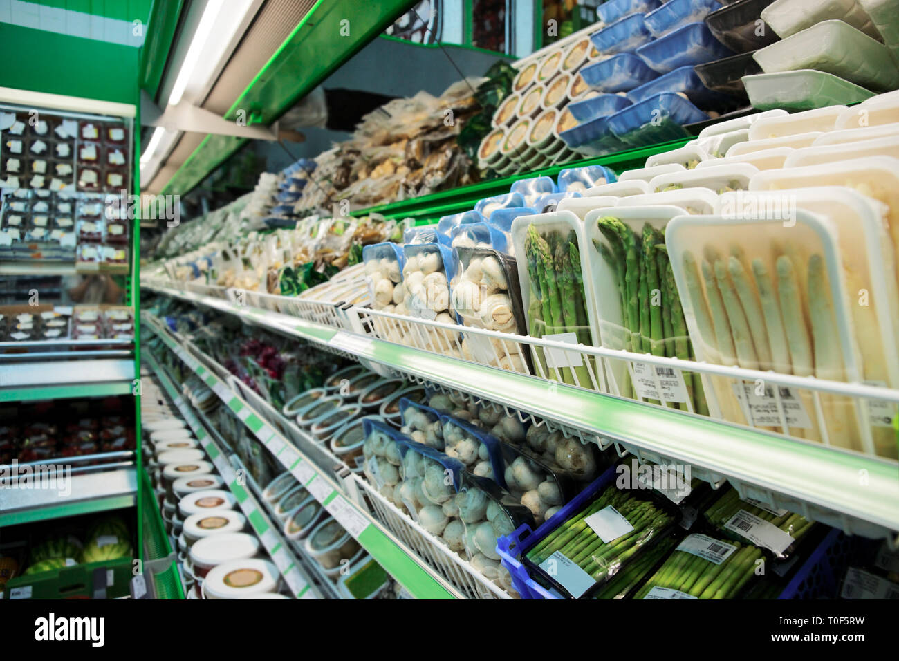 Shelf with groceries in supermarket, tm's removed Stock Photo