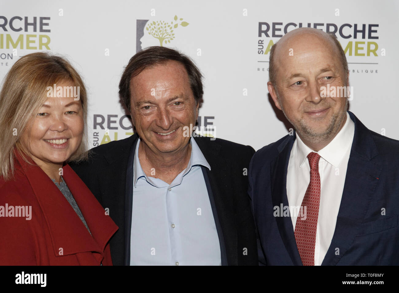 Paris, France. 18th Mar 2019. Michel Edouard Leclerc, Natalia Olzoeva and Olivier De Ladoucette - Photocall of the 14th Gala 2019 of the Association for Alzheimer Research at the Olympia in Paris on March 18, 2019, France Credit: Véronique PHITOUSSI/Alamy Live News Stock Photo