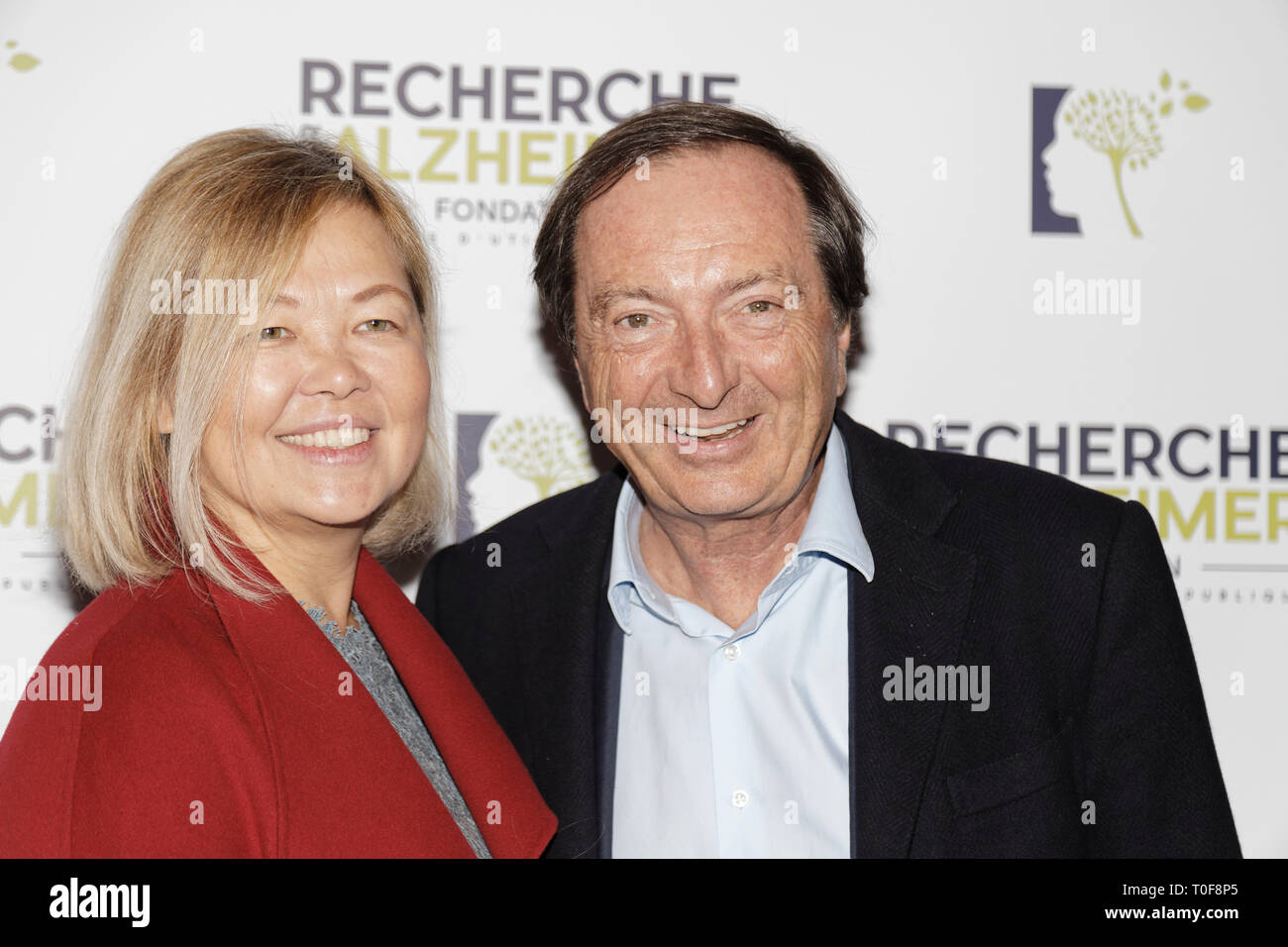 Paris, France. 18th Mar 2019. Michel Edouard Leclerc and Natalia Olzoeva - Photocall of the 14th Gala 2019 of the Association for Alzheimer Research at the Olympia in Paris on March 18, 2019, France Credit: Véronique PHITOUSSI/Alamy Live News Stock Photo