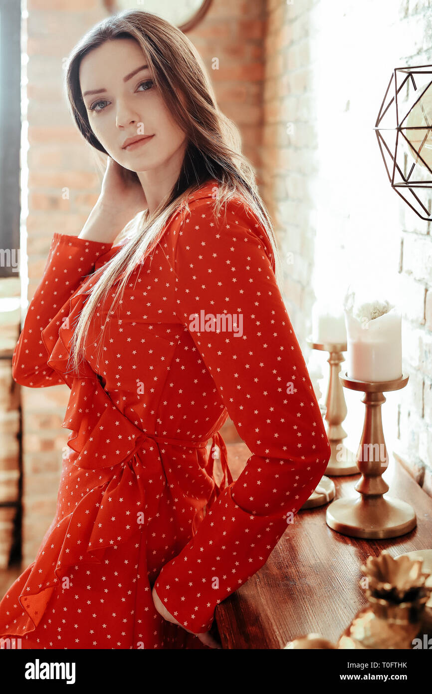 Beautiful woman in red dress Stock Photo - Alamy