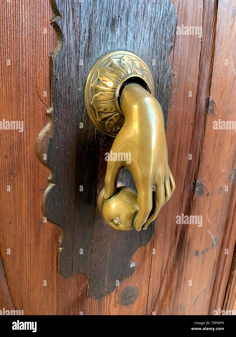 Close up hand door knocker hi-res stock photography and images - Alamy