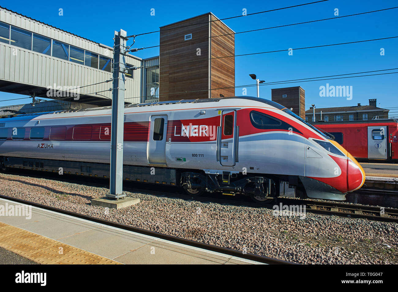 New Azuma streamlined trains in LNER railway livery at Peterborough station. Stock Photo