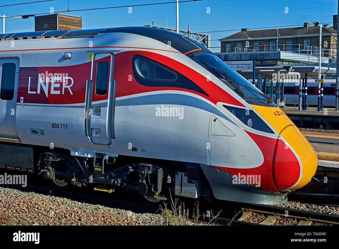 New Azuma streamlined trains in LNER railway livery at Peterborough station. Stock Photo