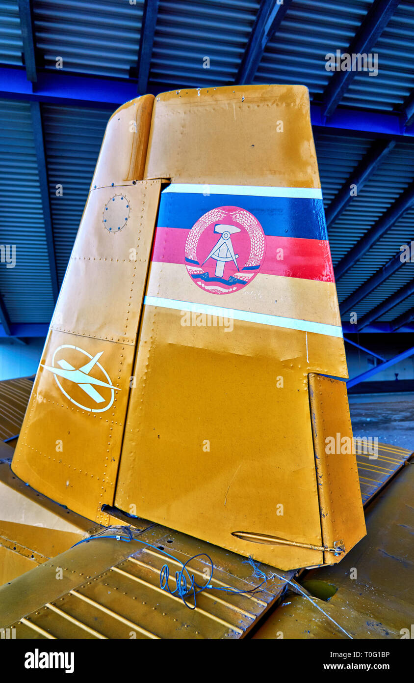 Agricultural plane in yellow with GDR flag. Stock Photo