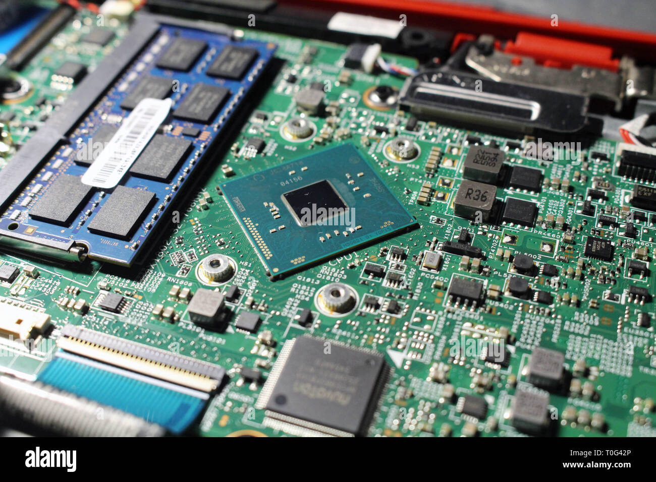 Closeup view at laptop motherboard and components. Processor and memory  look like mini cities Stock Photo - Alamy