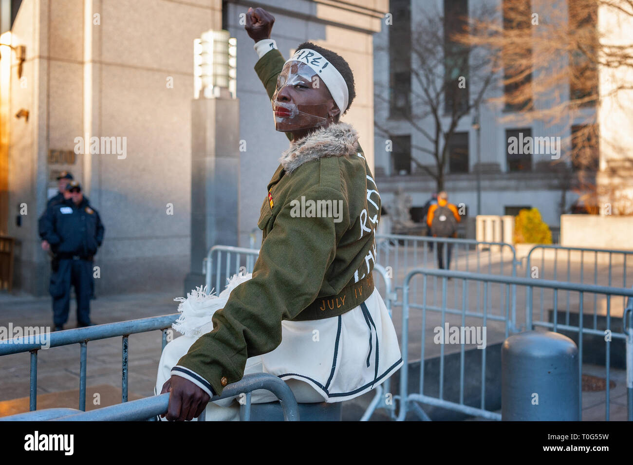 New York City, United States. 18th Mar, 2019. Today Patricia Okoumou, the activist who climbed the Statue of Liberty in July 2018 in protest of the Trump administration's zero-tolerance immigration policies was sentenced in the Southern District Court of New York In Manhattan to 5 years of probation. Before the sentencing, supporters gathered in a show of support alongside Ms. Okoumou who had covered her face in plastic tape to protest the limits imposed on her freedom of expression. Credit: Gabriele Holtermann Gorden/Pacific Press/Alamy Live News Stock Photo