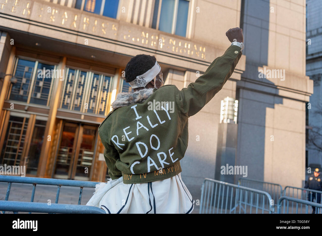 New York City, United States. 18th Mar, 2019. Today Patricia Okoumou, the activist who climbed the Statue of Liberty in July 2018 in protest of the Trump administration's zero-tolerance immigration policies was sentenced in the Southern District Court of New York In Manhattan to 5 years of probation. Before the sentencing, supporters gathered in a show of support alongside Ms. Okoumou who had covered her face in plastic tape to protest the limits imposed on her freedom of expression. Credit: Gabriele Holtermann Gorden/Pacific Press/Alamy Live News Stock Photo