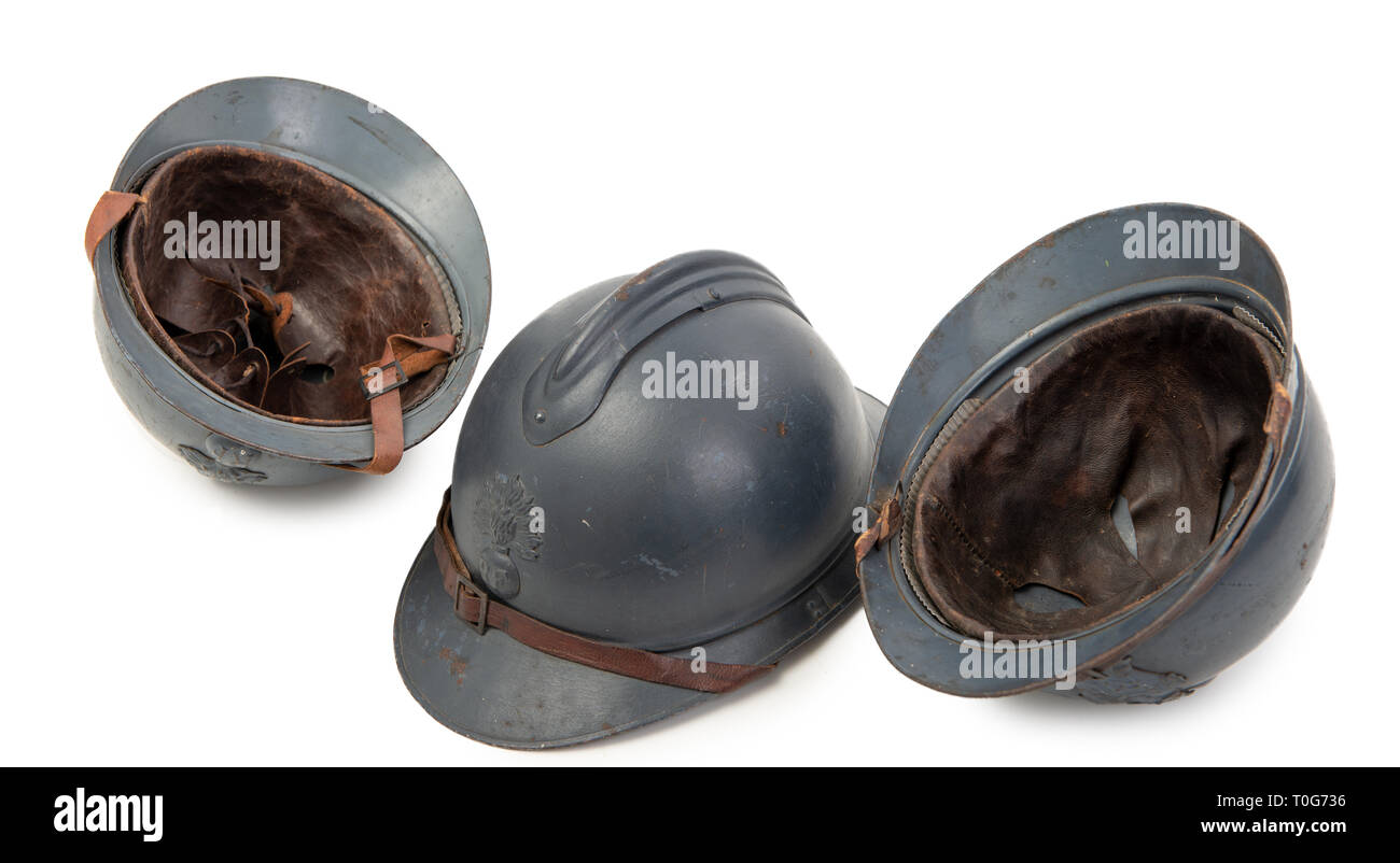 three french military helmets of the First World War on the white background Stock Photo