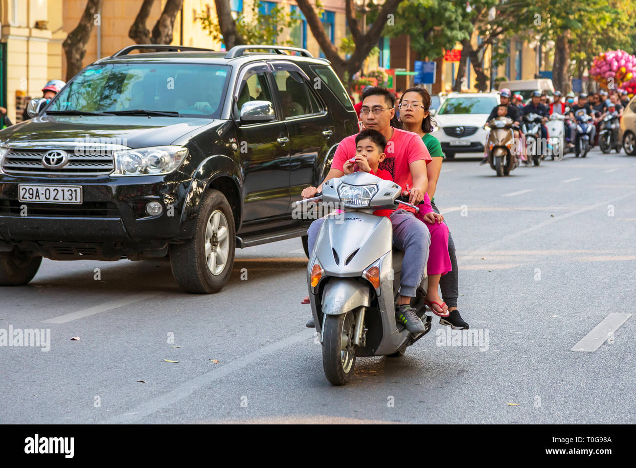 Family on a motorcycle, Hanoi, Vietnam, Asia Stock Photo