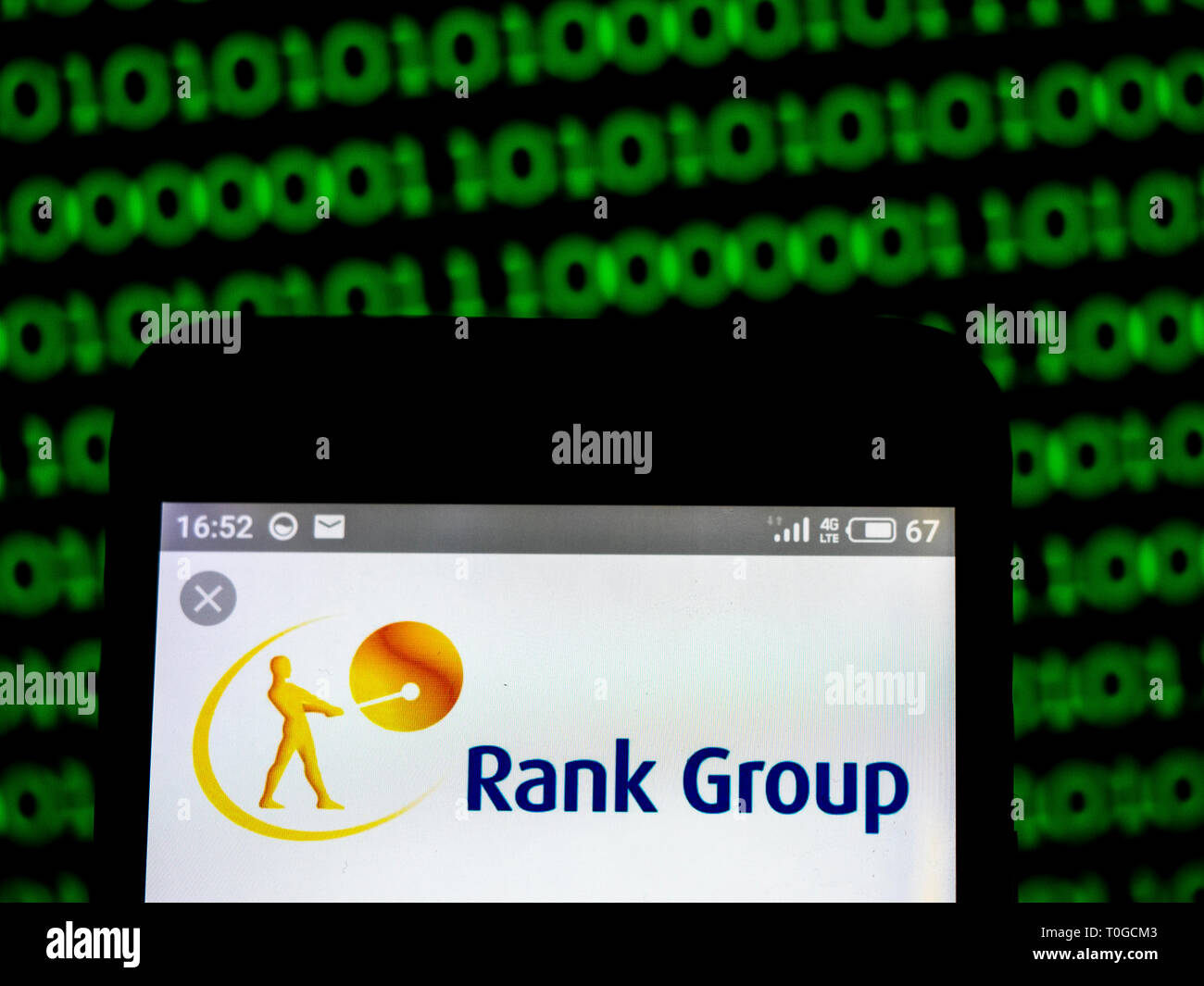 Rank Group Finance plc company logo seen displayed on smart phone. Stock Photo