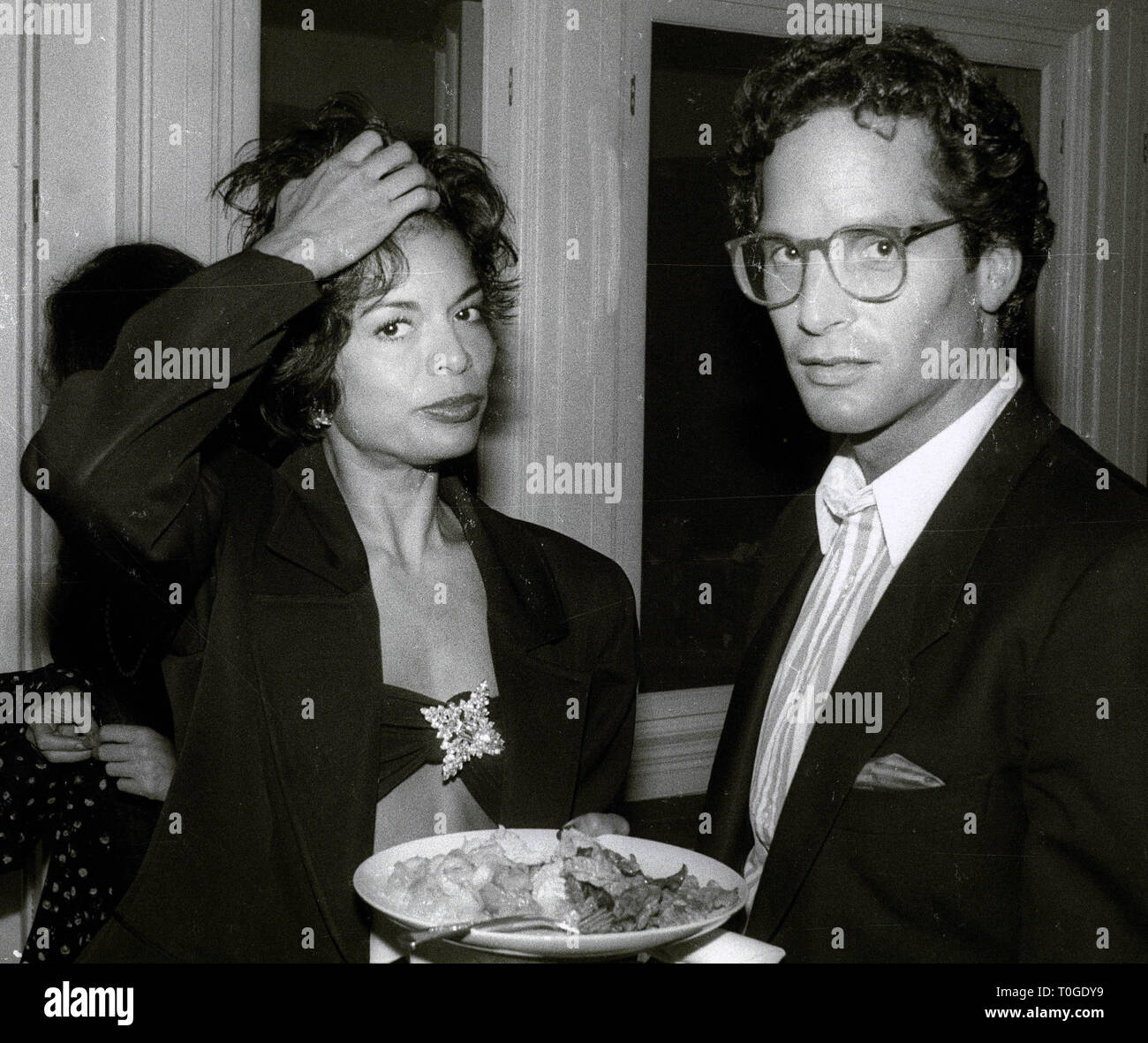 Bianca Jagger and boyfriend Glenn Dubin at the Southampton Parish Art Museum 1986 Photo By John Barrett/PHOTOlink Stock Photo