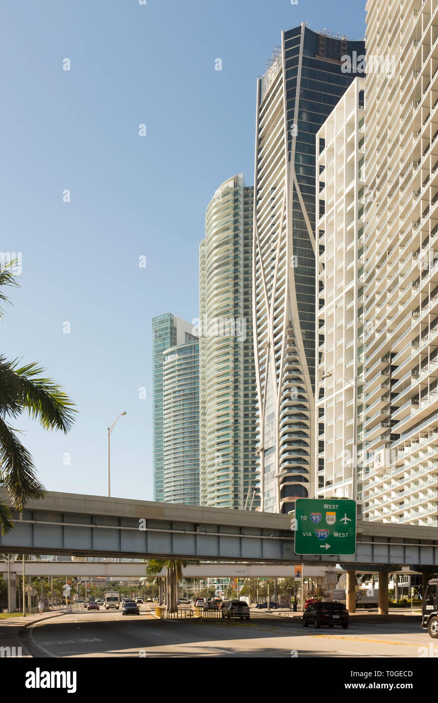 One Thousand Museum, by architect Zaha Hadid,  flanked by other buildings on Biscayne Boulevard in Miami, Florida, U.S.A Stock Photo
