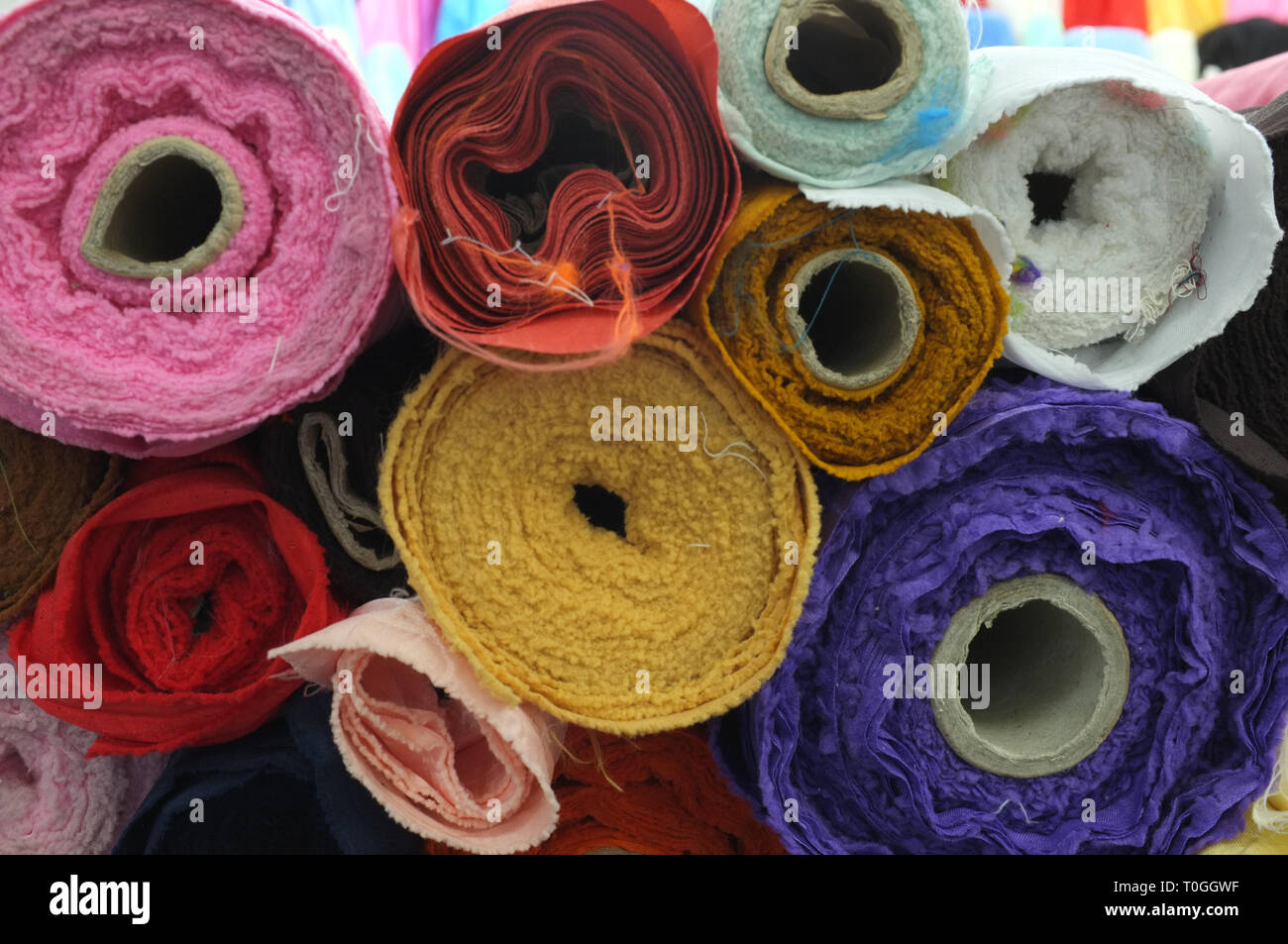 Colorful roll  fabric background. Stock Photo