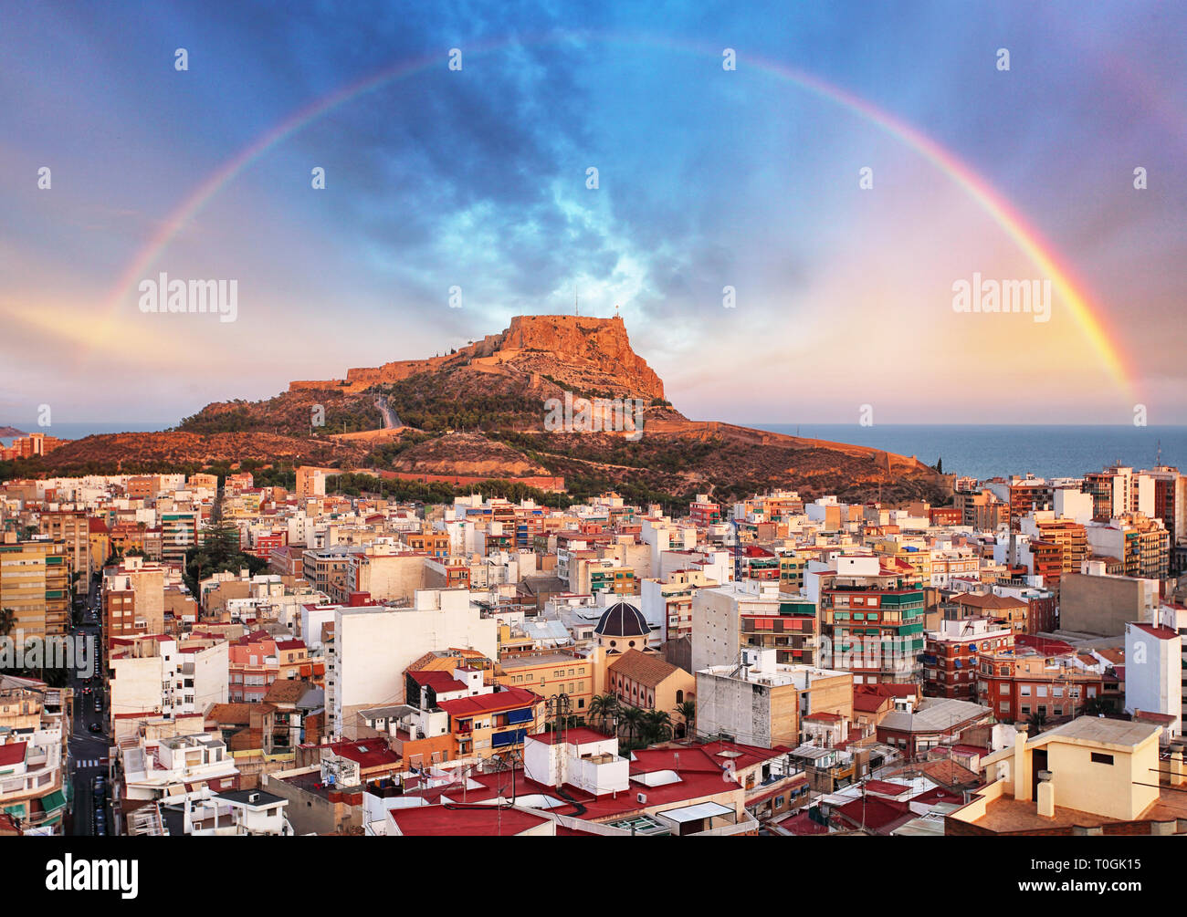 Alicante in Spain at sunset with rainbow Stock Photo