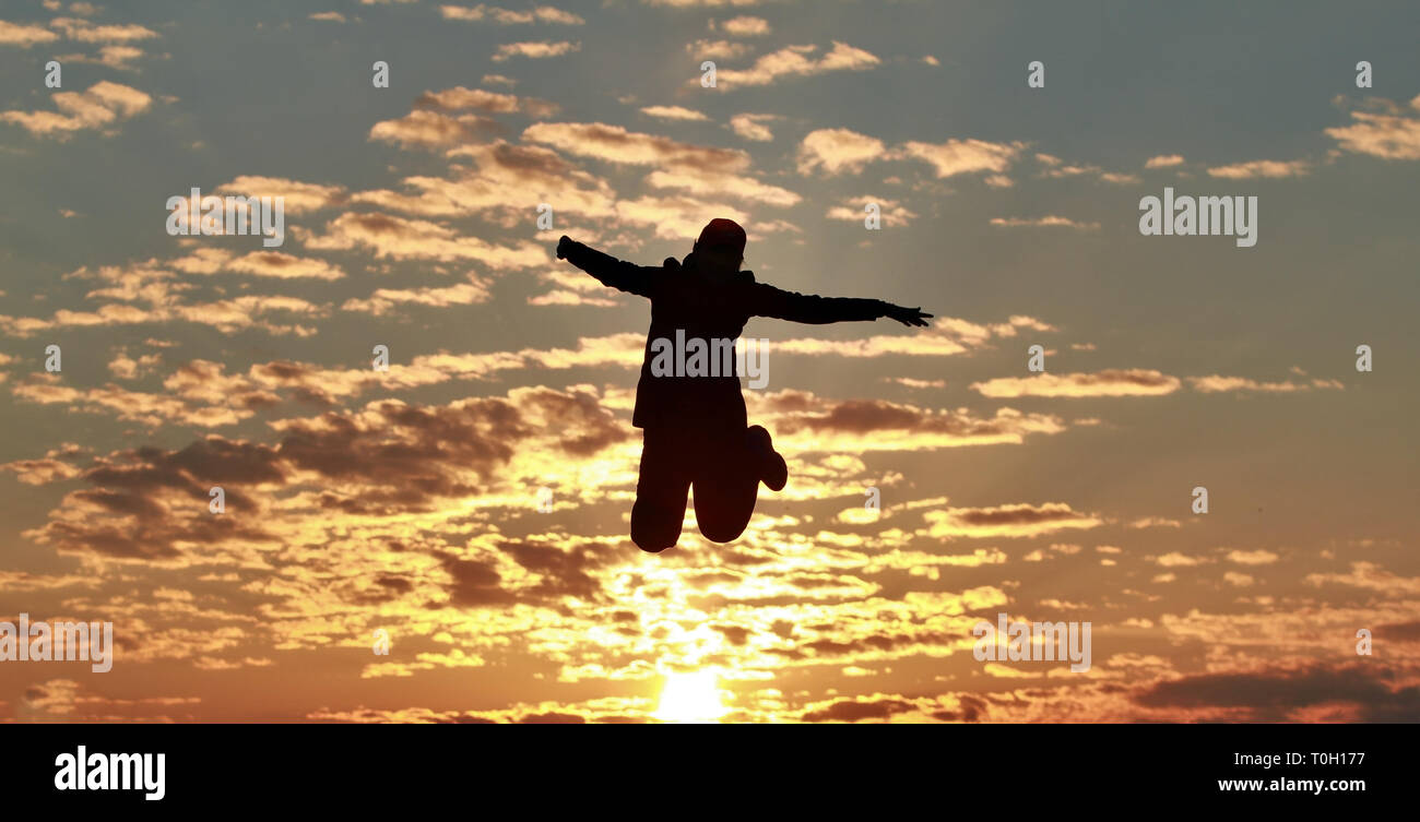 Happy girl jumping hi-res stock photography and images - Alamy