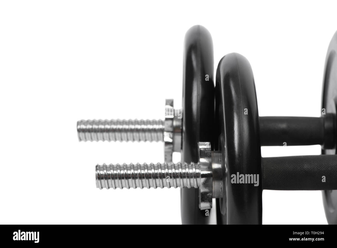 Two adjustable dumbbells isolated on white Stock Photo