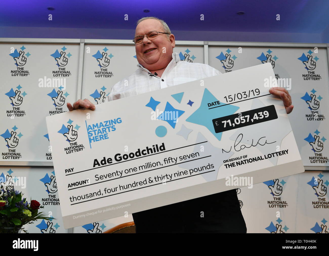 Ade Goodchild, 58, a factory worker from Hereford celebrates after scooping £71,057,439 in Friday's EuroMillions draw at the Abbey Hotel, Great Malvern. Stock Photo