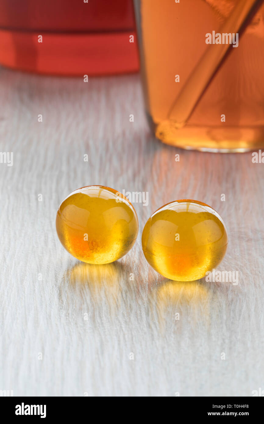 Download Pair Of Yellow Honey Pearls Close Up In Front Of A Glass Hot Tea Stock Photo Alamy Yellowimages Mockups