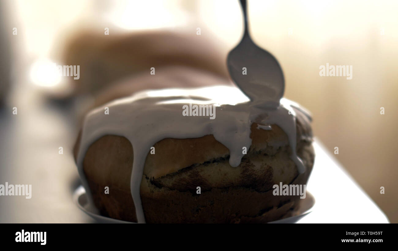 Frosting spread on easter cake, have fun Stock Photo