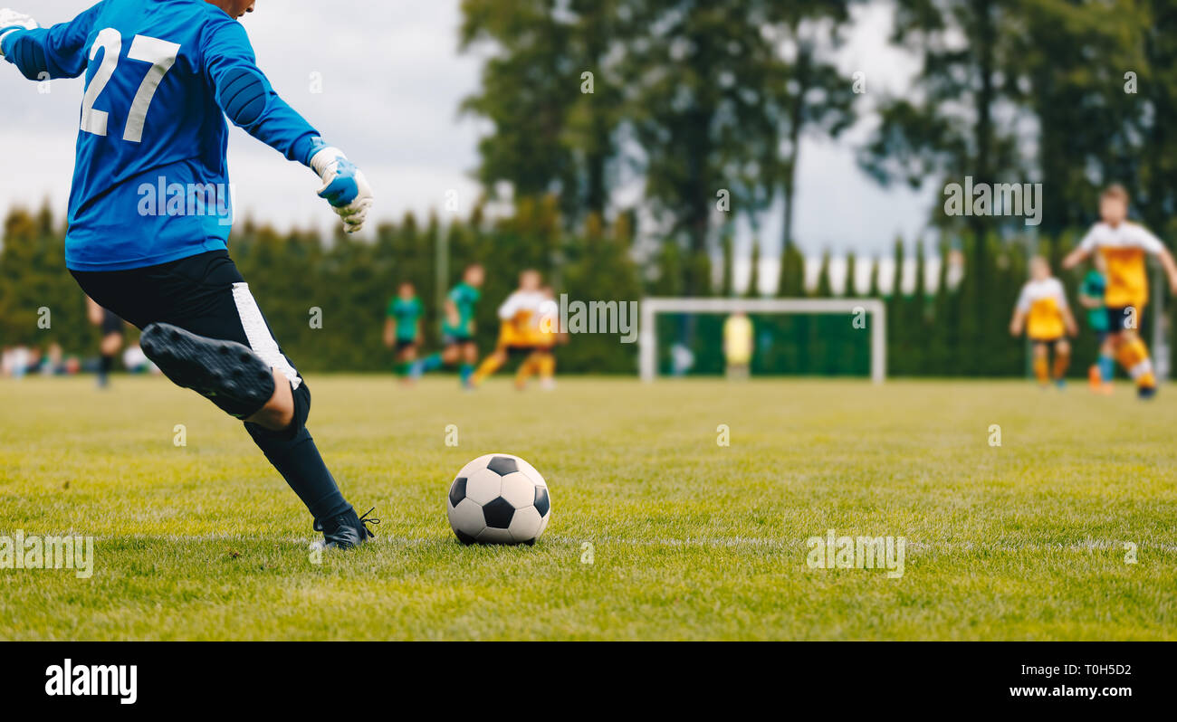 Soccer Football Goalkeeper Goal Kick. Goalie Kick on the Pitch During