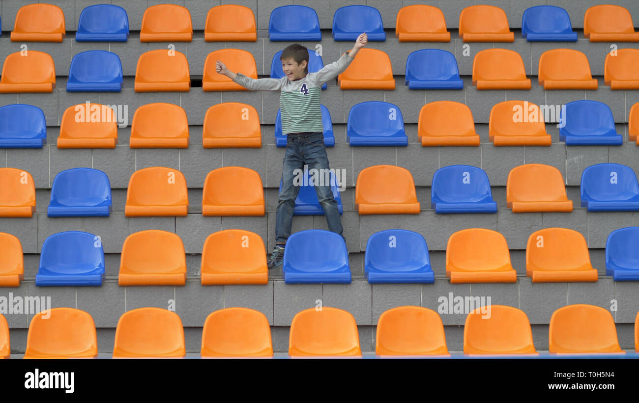 Boy Glad His Team Scored A Goal At The Stadium Stock Photo Alamy Boy Glad His Team Scored A Goal At The Stadium Stock Photo Alamy