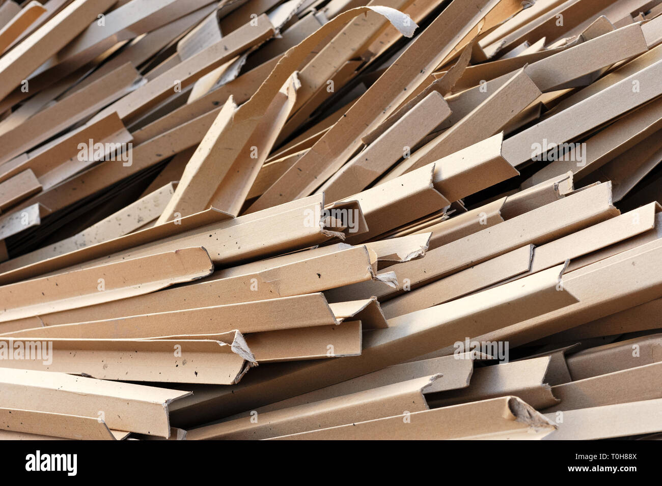 Pieces Of Cardboard Boxes On The Recycling Plant. CloseUp Of Cardboard