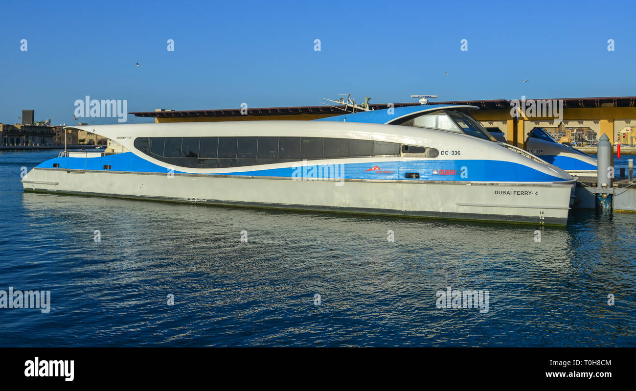 Dubai, UAE - Dec 9, 2018. A speedboat running on Dubai Creek. The creek is a man-made waterway made for the convenience of trade ships. Stock Photo